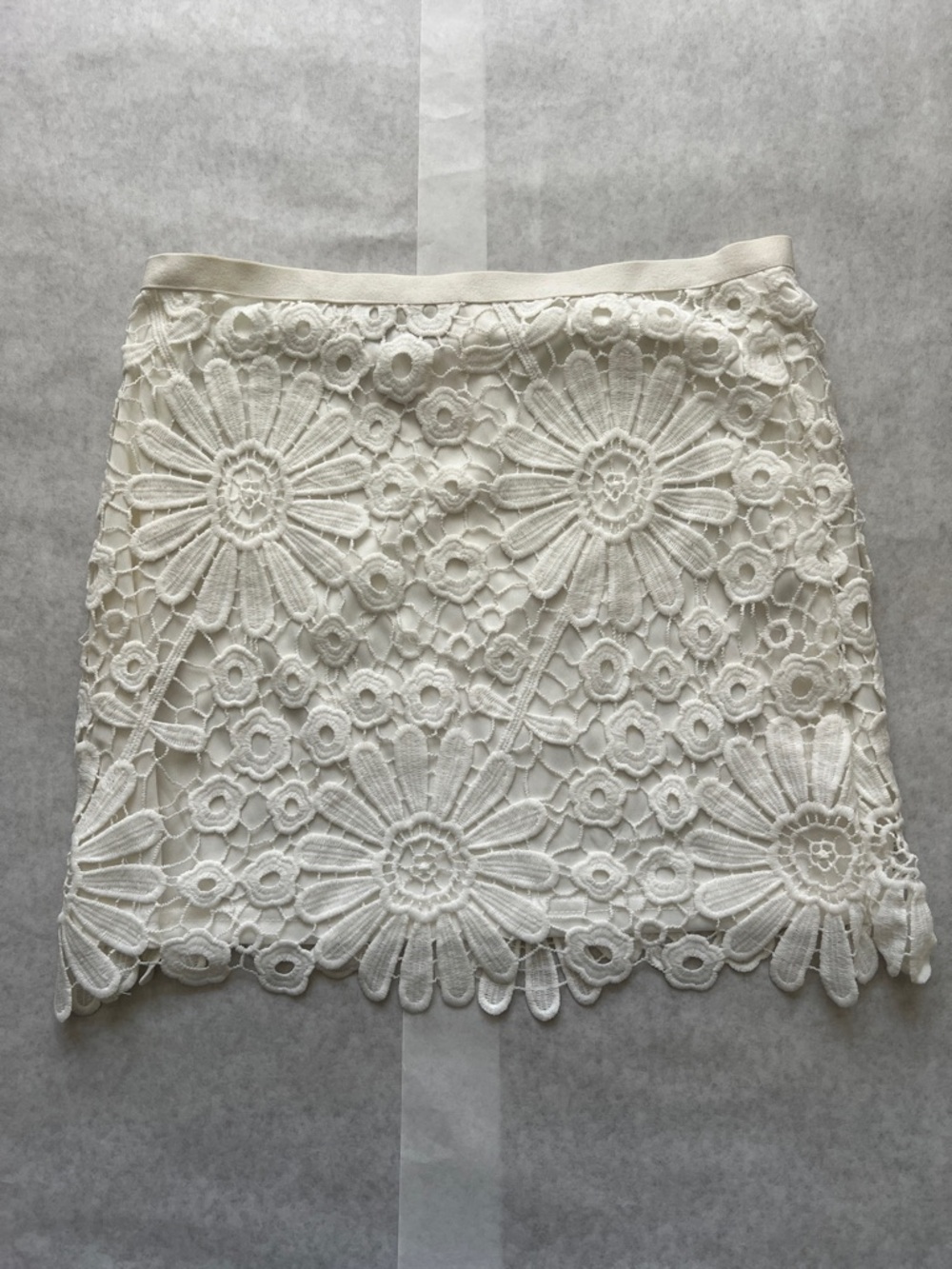 the clothing company White Crochet Floral Mini Skirt